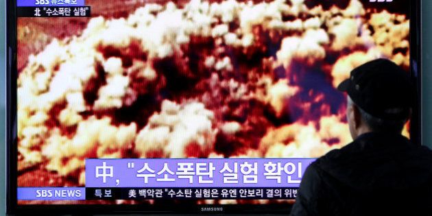 A man watches a television screen showing a news broadcast on North Korea's nuclear test at Seoul Station in Seoul, South Korea, on Wednesday, Jan. 6, 2015. North Korea said it successfully tested its first hydrogen bomb, the fourth time it has detonated a nuclear device and a move that reignites tensions with neighbors including China after months of calm. Photographer: SeongJoon Cho/Bloomberg via Getty Images