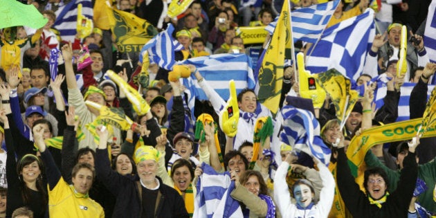 (AUSTRALIA & NEW ZEALAND OUT) Soccer 2006. Supporters of both countries cheer from the stands during the World Cup warm-up friendly match between Australia and Greece at the MCG in Melbourne, 25 May 2006. THE AGE Picture by WAYNE TAYLOR (Photo by Fairfax Media/Fairfax Media via Getty Images)