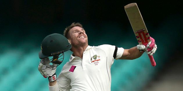 Australia's David Warner leaps as he celebrates after hitting a century during their cricket test match against the West Indies in Sydney, Australia, Thursday, Jan. 7, 2016. (AP Photo/Rob Griffith)
