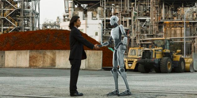 Robot and human greeting in front of factory