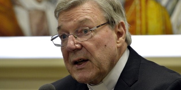 Australian Cardinal George Pell, Prefect of the Secretariat for the Economy of the Holy See, attends a press conference on March 31, 2014 in Vatican. Cardinal George Pell and Italian writer Francesco Lozupone presented the book 'Co-responsability and transparency in the administration of church property'. AFP PHOTO / ANDREAS SOLARO (Photo credit should read ANDREAS SOLARO/AFP/Getty Images)