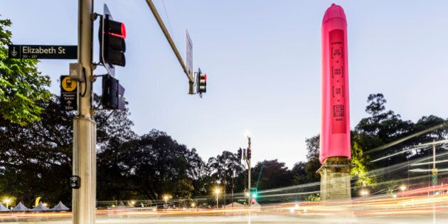 SYDNEY, AUSTRALIA - FEBRUARY 27: An 18 meter pink condom was slipped onto the Hyde Park Obelisk on February 27, 2016 in Sydney, Australia. The installation is intended to promote safe sex in the lead up to the Sydney Gay and Lesbian Mardi Gras on Saturday 5 March. (Photo by Brook Mitchell/Getty Images)