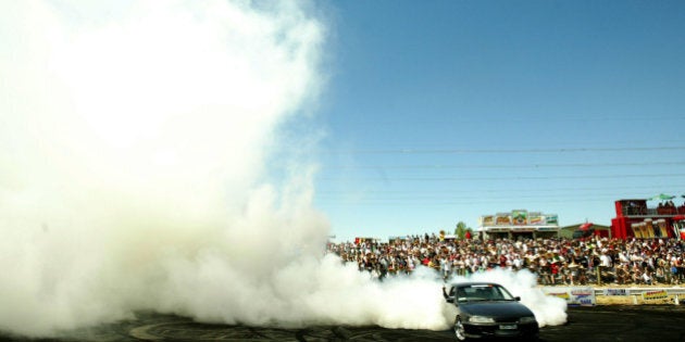 (AUSTRALIA & NEW ZEALAND OUT) Summernats 19 car festival held in Canberra over four days that brings people from around Australia to the capital. The final of the burnout competition was held as the final event of the festival, 8 January 2006. SMH Picture by CHRIS LANE (Photo by Fairfax Media/Fairfax Media via Getty Images)