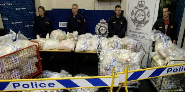 (AUSTRALIA & NEW ZEALAND OUT) Officials with the biggest ever MDMA seizure by Australian Customs Service and the Australian Federal Police, 15 November 2004. SMH Picture by PAUL MILLER. (Photo by Fairfax Media/Fairfax Media via Getty Images)