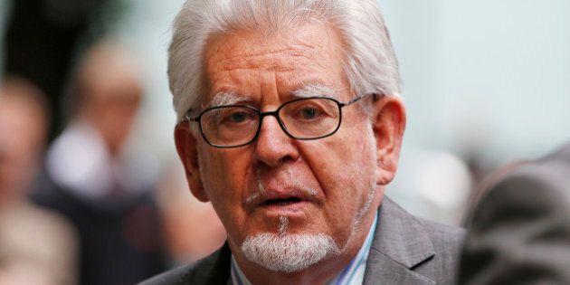 Veteran entertainer Rolf Harris leaves the Southwark Crown Court in London, Monday, June 30, 2014. A jury Monday found Australian-born Harris guilty of 12 counts of indecent assault.The 84-year-old was convicted of indecent assault on four victims aged 19 or under between 1968 and 1986. (AP Photo/Lefteris Pitarakis)