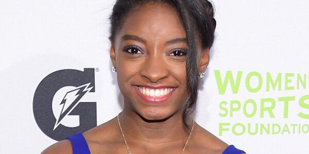 NEW YORK, NY - OCTOBER 15: Gymnast Simone Biles attends the WomenÂs Sports FoundationÂs 35th Annual Salute to Women In Sports awards, a celebration and a fundraiser to ensure more girls and women have access to sports, at Cipriani Wall Street on October 15, 2014 in New York City. (Photo by Michael Loccisano/Getty Images)