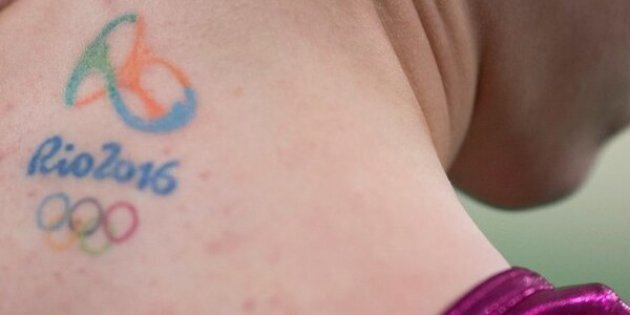 Italy's Vanessa Ferrari has a tattoo of the Olympic rings on the back her  next at the gymnastics..., Stock Photo, Picture And Rights Managed Image.  Pic. PAH-44454392 | agefotostock