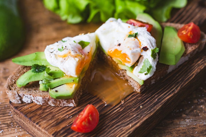 Eggs on whole grain toast with avocado and veggies is perfect post-workout fuel.