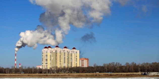 This picture taken on November 22, 2015 shows smoke belching from a heating factory chimney in Heihe, in northeastern China's Heilongjiang province. China is the world's biggest polluter, and its emissions of the greenhouse gases that cause climate change -- along with its ability to fulfill its promises -- will be at the centre of talks starting in Paris this month that are crucial to the future of the planet. CHINA OUT AFP PHOTO / AFP / STR (Photo credit should read STR/AFP/Getty Images)