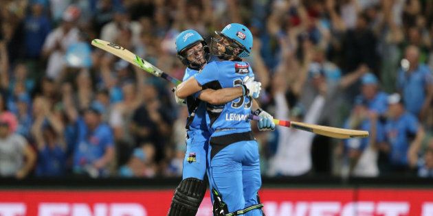 ADELAIDE, AUSTRALIA - JANUARY 13: Tim Ludeman and Jake Lehmann of Adelaide celebrate their win during the Big Bash League match between the Adelaide Strikers and the Hobart Hurricanes at Adelaide Oval on January 13, 2016 in Adelaide, Australia. (Photo by James Elsby/Getty Images)