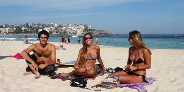 SYDNEY, AUSTRALIA - OCTOBER 31: Students from Latin America enjoy the warm weather down at Bondi Beach on October 31, 2014 in Sydney, Australia. Australia is expecting much hotter temperatures than usual for the next three months. (Photo by Daniel Munoz/Getty Images)