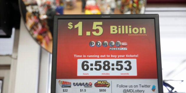 A sign for the Powerball jackpot is seen at the Sunnybrook Tavern and Liquor Store, Wednesday, Jan. 13, 2016 in Fort Washington, Md. The estimated Powerball jackpot was holding steady at $1.5 billion just hours ahead of Wednesday, Jan. 13, 2016, night's drawing, though same-day ticket sales could push the record-breaking amount even higher. (AP Photo/Alex Brandon)