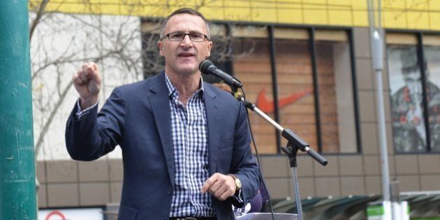 MELBOURNE, AUSTRALIA - SEPTEMBER 12: Leader of the parliamentary caucus of the Australian Greens Richard Di Natale delivers a speech during a demonstration to protest accepting so few Syrian and Iraqi refugees in Melbourne, Australia on September 12, 2015. (Photo by Recep Sakar/Anadolu Agency/Getty Images)