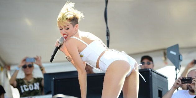 Miley Cyrus performs at IHeartRadio Music Village, Saturday, September, 21, 2013 in Las Vegas, NV. (Photo by Al Powers/Powers Imagery/Invision /AP)