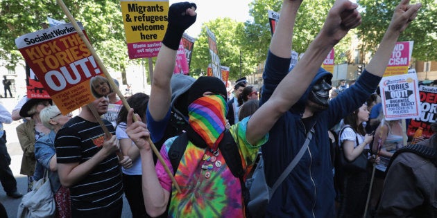 Protestors with placards outside Downing Street on Saturday
