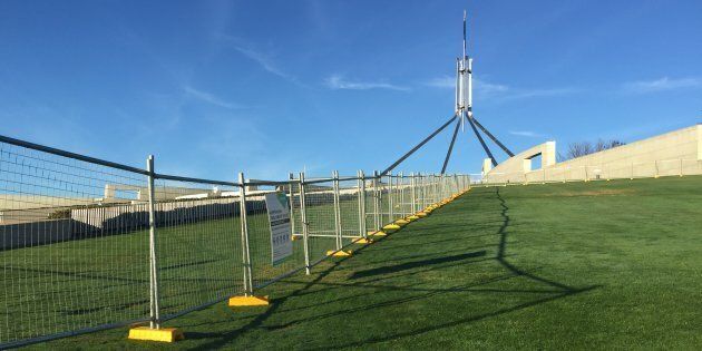 A temporary Parliament House security fence in readiness for a permanent one.