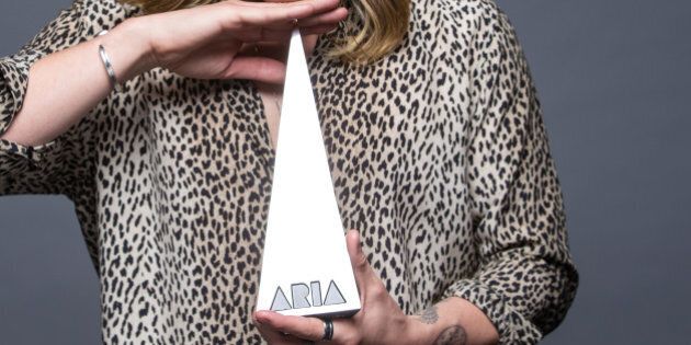 SYDNEY, AUSTRALIA - NOVEMBER 26: (EXCLUSIVE COVERAGE) Conrad Sewell poses for a portrait with an ARIA for Song Of The Year during the 29th Annual ARIA Awards 2015 at The Star on November 26, 2015 in Sydney, Australia. (Photo by Mark Nolan/WireImage)