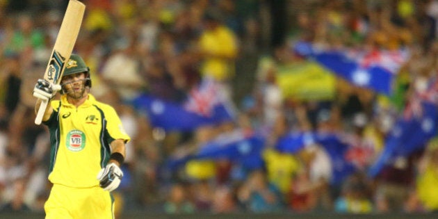 MELBOURNE, AUSTRALIA - JANUARY 17: Glenn Maxwell of Australia celebrates as he reaches his fifty during game three of the One Day International Series between Australia and India at the Melbourne Cricket Ground on January 17, 2016 in Melbourne, Australia. (Photo by Scott Barbour/Getty Images)