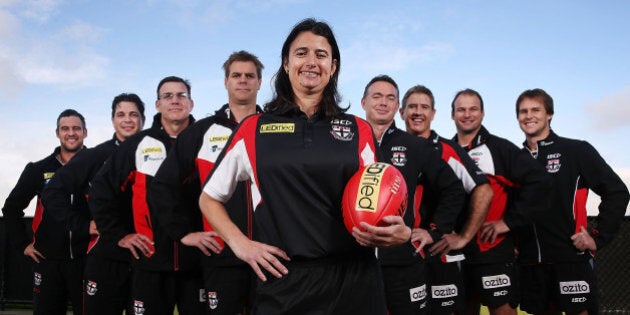MELBOURNE, AUSTRALIA - JUNE 02: New Saints Development coach Peta Searle, the AFL's first female assistant coach, poses with the coaching team during a St Kilda Saints AFL press conference at Linen House Oval on June 2, 2014 in Melbourne, Australia. (L-R): Lindsay Gilbee, Adam Kingsley, Simon McPhee, Danny Sexton, Peta Searle, Alan Richardson, Paul Hudson, Aaron Hamill and David Teague. (Photo by Michael Dodge/Getty Images)