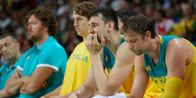 RIO DE JANEIRO, BRAZIL - AUGUST 19: Andrew Bogut #6 of Australia reacts with teammates on the bench during the Men's Semifinal match against Serbia on Day 14 of the Rio 2016 Olympic Games at Carioca Arena 1 on August 19, 2016 in Rio de Janeiro, Brazil. (Photo by Jamie Squire/Getty Images)