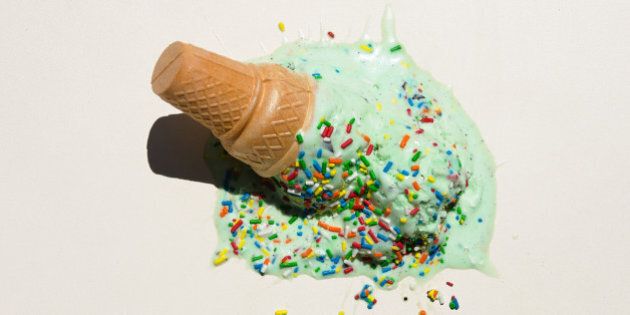 Ice cream cone smashed on white background