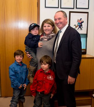 Beau Cosgrove (held by mum Samantha) with his brothers and Barnaby Joyce.