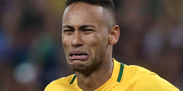 2016 Rio Olympics - Soccer - Final - Men's Football Tournament Gold Medal Match Brazil vs Germany - Maracana - Rio de Janeiro, Brazil - 20/08/2016. Neymar (BRA) of Brazil reacts after scoring the last penalty shootout. REUTERS/Marcos Brindicci FOR EDITORIAL USE ONLY. NOT FOR SALE FOR MARKETING OR ADVERTISING CAMPAIGNS.