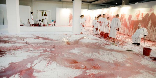Austrian artist Hermann Nitsch's performances, like this one in Istanbul, often involve bucket loads of blood.