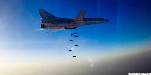 SYRIA - AUGUST 16, 2016: A Tupolev Tu-22M3 long-range bomber carries out airstrikes against ISIS and Al-Nusra Front targets in the Aleppo, Dayr al-Zawr and Idlib Governorates. This is the first time Russia's Aerospace Forces carry out air strikes against terrorist targets in Syria operating from Iran's Hamedan Air Base. Earlier, the Russian Aerospace Forces' long-range bombers used to take off at Russian airfields and frontline bombers at Hmeymim airbase in Syria. Video screen grab/Russian Defence Ministry's Press and Information Department/TASS (Photo by TASS\TASS via Getty Images)