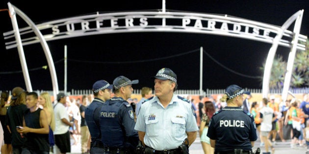 GOLD COAST, AUSTRALIA - NOVEMBER 28: Police are seen patrolling the area during Australian 'schoolies' celebrations following the end of the year 12 exams on November 28, 2014 in Gold Coast, Australia. Every year over thousands of students celebrate 'Schoolies Week', which marks the end of the school year. (Photo by Bradley Kanaris/Getty Images)