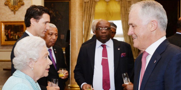 ATTARD, MALTA - NOVEMBER 27: Queen Elizabeth II talks to Australian Prime Minister Malcolm Turnbull (right) during a Heads of Government reception at the San Anton Palace on November 27, 2015 near Attard, Malta. Queen Elizabeth II, The Duke of Edinburgh, Prince Charles, Prince of Wales and Camilla, Duchess of Cornwall arrived yesterday to attend the Commonwealth Heads of State Summit. (Photo by John Stillwell-Pool/Getty Images)