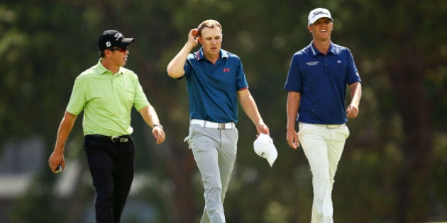 SYDNEY, AUSTRALIA - NOVEMBER 24: Jordan Spieth of the United States (C) walks with Matt Jones of Australia (R) and Gary Barter (L), coach of Matt Jones, on the 6th fairway during a practice round ahead of the 2015 Australian Open at The Australian Golf Course on November 24, 2015 in Sydney, Australia. (Photo by Matt King/Getty Images)