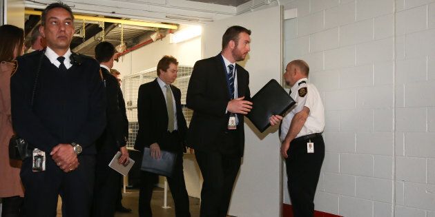 AFP officers in the basement of Parliament House in Canberra