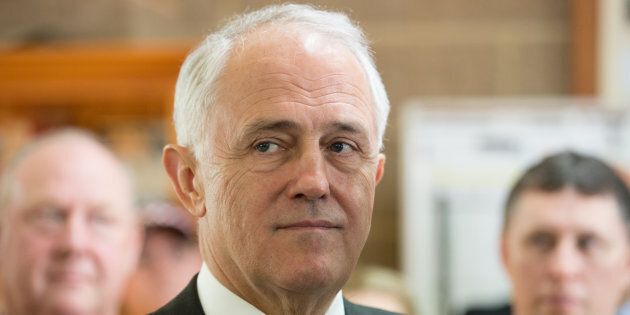 The Prime Minister Malcolm Turnbull defends the AFP over NBN raids