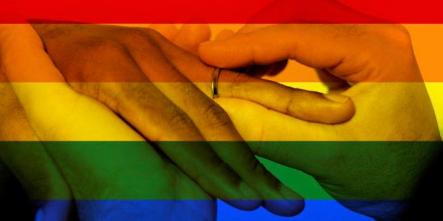 Photo composite of Iconic image style used in social media to celebrate legalization of same-sex marriage. This image style, of a profile picture with an overlaid rainbow flag went viral in social media to celebrate the court decision to legalize gay marriage.