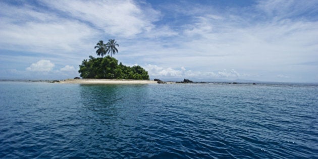 Small island on horizon, Tetepare, Solomon Islands.