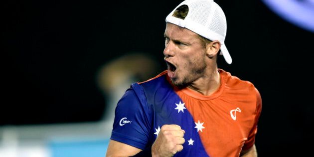 Lleyton Hewitt of Australia gestures during his second round match against David Ferrer of Spain at the Australian Open tennis championships in Melbourne, Australia, Thursday, Jan. 21, 2016.(AP Photo/Andrew Brownbill)