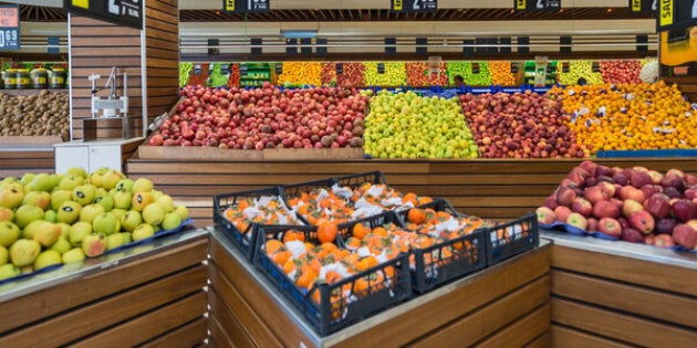 Produce Section in a Supermarket - A supermarket, a large form of the traditional grocery store, is a self-service shop offering a wide variety of food and household products, organized into aisles. It is larger in size and has a wider selection than a traditional grocery store, but is smaller and more limited in the range of merchandise than a hypermarket or big-box shop. The supermarket typically comprises meat, fresh produce, dairy, and baked goods aisles, along with shelf space reserved for canned and packaged goods as well as for various non-food items such as household cleaners, pharmacy products and pet supplies. Most supermarkets also sell a variety of other household products that are consumed regularly, such as alcohol (where permitted), medicine, and clothes, and some stores sell a much wider range of non-food products.