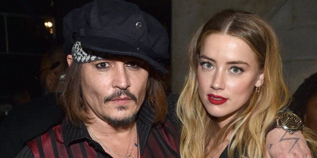 Johnny Depp and actress Amber Heard attend the 58th Grammy Awards at Staples Center on Feb. 15, 2016, in Los Angeles, California.