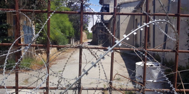 DERYNEIA, CYPRUS - 2016/05/06: Razor wire and metal fencing blocks off a road in the old city area of Nicosia. The divided city is the capital of both the Republic of Cyprus and the Turkish Republic of Northern Cyprus. (Photo by Dominic Dudley/Pacific Press/LightRocket via Getty Images)