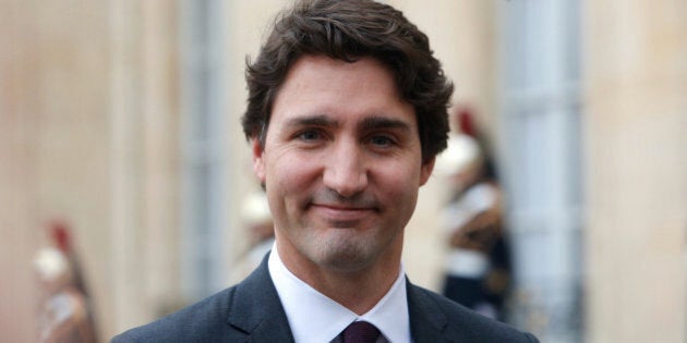 Canadian Prime Minister Justin Trudeau answers media after a meeting, at the Elysee Palace, in Paris, Sunday, Nov. 29, 2015. More than 140 world leaders are gathering around Paris for high-stakes climate talks that start Monday, and activists are holding marches and protests around the world to urge them to reach a strong agreement to slow global warming. (AP Photo/Thibault Camus)