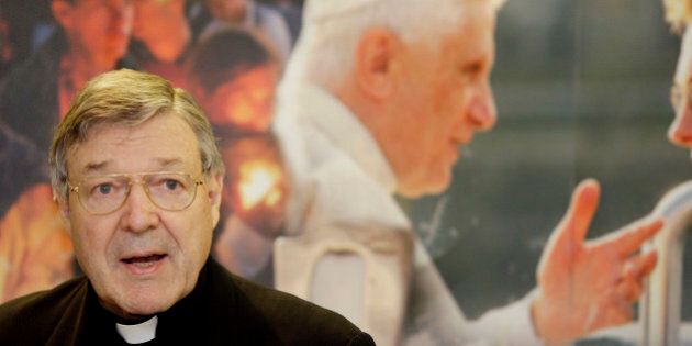 FILE - This May 28, 2008 file photo shows Cardinal George Pell addressing a press conference for World Youth Day in Sydney, Australia. On Thursday, Feb. 28, 2013 the Vatican is playing down an Australian cardinal's comments that Pope Benedict XVI's decision to resign was