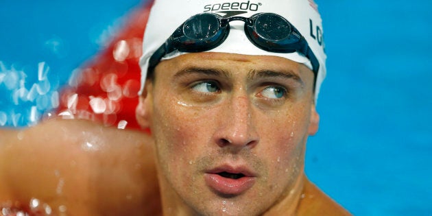 Ryan Lochte of the U.S. looks on during training for the World Swimming Championships at the Sant Jordi arena in Barcelona July 27, 2013. REUTERS/Michael Dalder (SPAIN - Tags: SPORT SWIMMING)