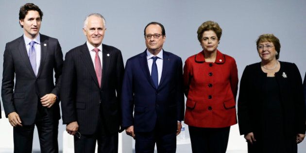 From the left, Canadian Prime Minister Justin Trudeau, Australian Prime Minister Malcolm Turnbull, French President Francois Hollande, Brazilian President Dilma Roussef, and Chilean President Michelle Bachelet attend the 'Mission Innovation: Accelerating the Clean Energy Revolution' meeting at the COP2, United Nations Climate Change Conference, in Le Bourget, north of Paris, Monday, Nov. 30 2015. (Ian Langsdon, Pool photo via AP)