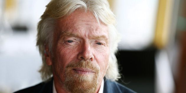 Richard Branson is bruised and battered after crashing his bike in the Caribbean.