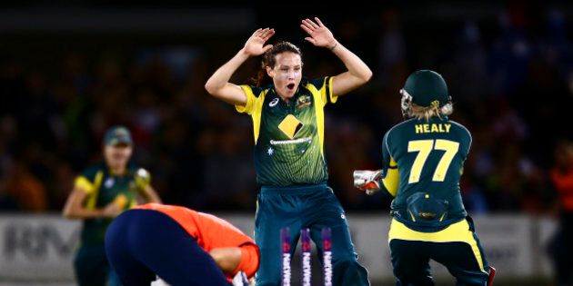 HOVE, ENGLAND - AUGUST 28: Megan Schutt of Australia celebrates with Alyssa Healy of Australia after bowling out Katherine Brunt of England during the 2nd NatWest T20 of the Women's Ashes Series between England and Australia Women at BrightonandHoveJobs.com County Ground on August 28, 2015 in Hove, United Kingdom. (Photo by Jordan Mansfield/Getty Images)