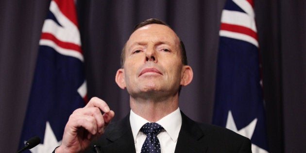 CANBERRA, AUSTRALIA - AUGUST 11: Prime Minister Tony Abbott announces a 26-28% carbon emissions target by 2020 during a press conference at Parliament House on August 11, 2015 in Canberra, Australia. Tony Smith was elected Speaker on 10, August following the resignation of Bronwyn Bishop. (Photo by Stefan Postles/Getty Images)