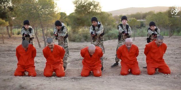 Children in fatigues are seen shooting prisoners in the ISIS video.
