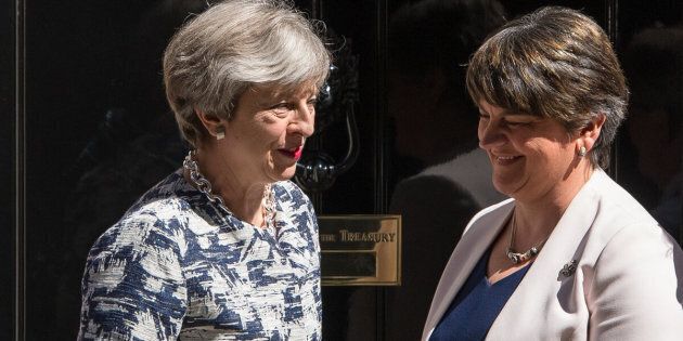 Prime Minister Theresa May greets DUP leader Arlene Foster outside 10 Downing Street in London ahead of talks aimed at finalising a deal to prop up the minority Conservative Government.