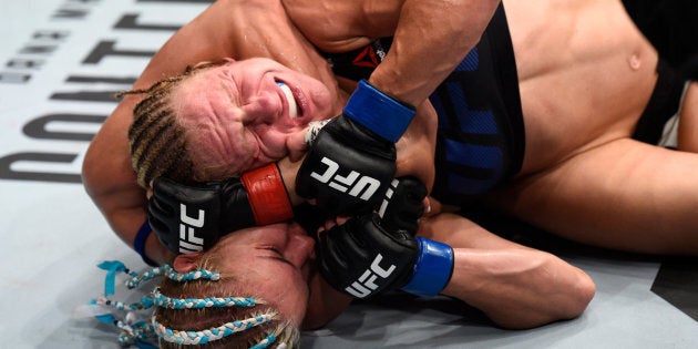 OKLAHOMA CITY, OK - JUNE 25: (L-R) Felice Herrig attempts to secure a rear choke submission against Justine Kish in their women's strawweight bout during the UFC Fight Night event at the Chesapeake Energy Arena on June 25, 2017 in Oklahoma City, Oklahoma. (Photo by Brandon Magnus/Zuffa LLC/Zuffa LLC via Getty Images)